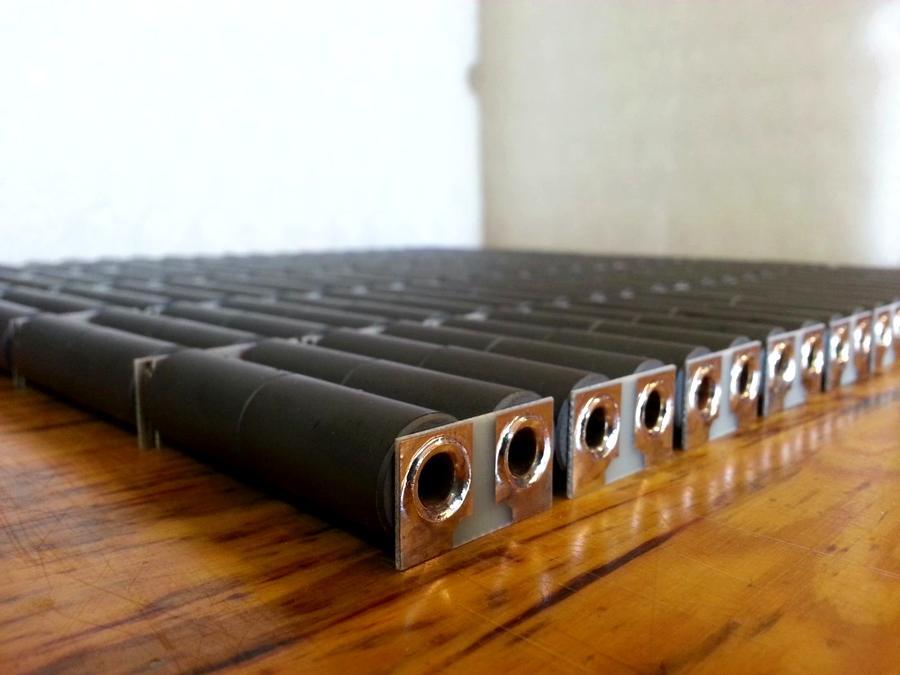 High-power RF transformer cores with brass tube windings